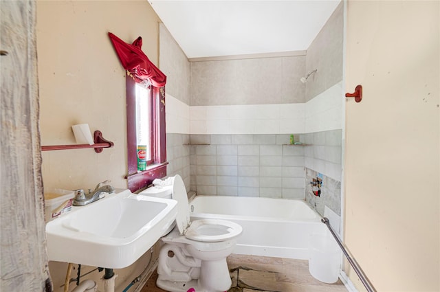 4103 Lumber Ln, Houston, TX 77016 - full bath featuring toilet and washtub / shower combination