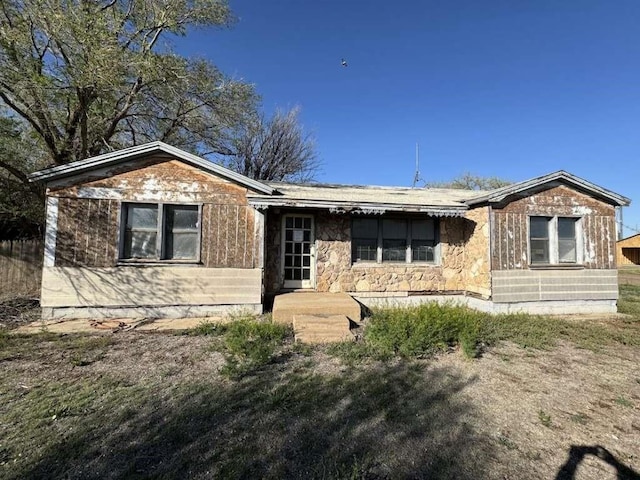 200 W 2nd St, Edmonson, TX 79032 - single story home featuring stone siding
