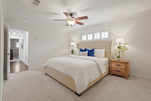5743 Braesheather Dr, Houston, TX 77096 - bedroom with crown molding, attic access, multiple windows, light colored carpet, and a ceiling fan