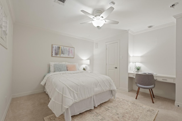 5743 Braesheather Dr, Houston, TX 77096 - bedroom with crown molding, light colored carpet, built in study area, and ceiling fan