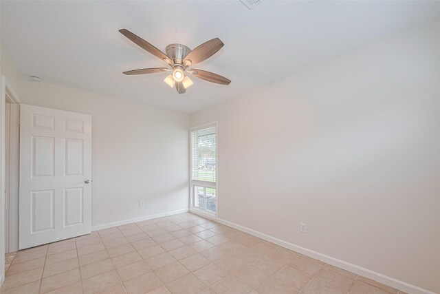 3810 Marlin Ln, La Porte, TX 77571 - empty room featuring a ceiling fan and light tile patterned floors