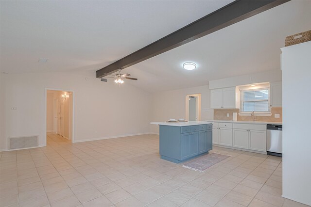 3810 Marlin Ln, La Porte, TX 77571 - kitchen featuring stainless steel dishwasher, white cabinetry, light countertops, open floor plan, and a ceiling fan