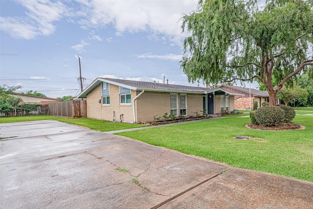 3810 Marlin Ln, La Porte, TX 77571 - view of front facade featuring driveway and brick siding