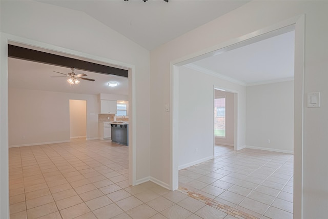 3810 Marlin Ln, La Porte, TX 77571 - empty room featuring light tile patterned floors, ceiling fan, vaulted ceiling, and crown molding