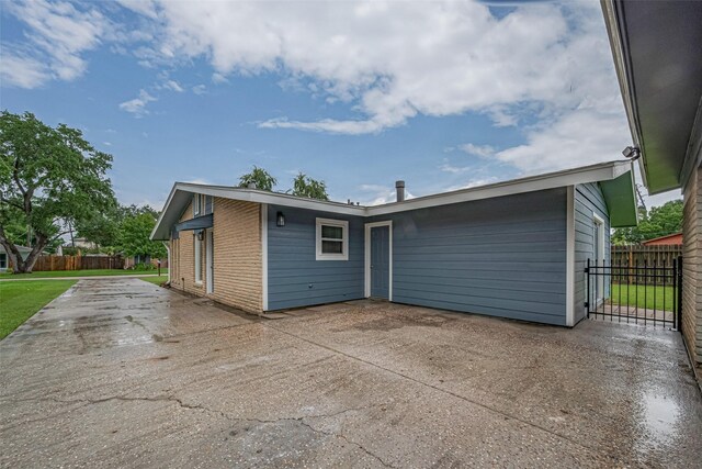 3810 Marlin Ln, La Porte, TX 77571 - back of property featuring a patio