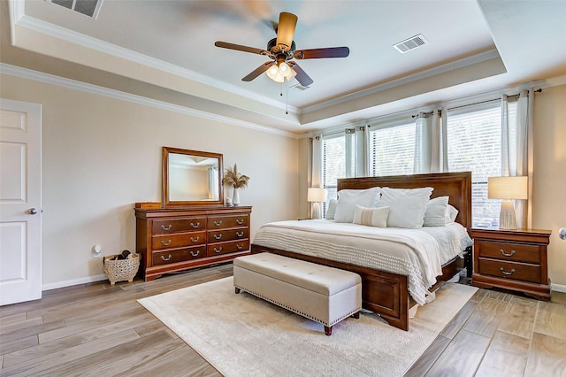 20910 Cordell Landing Dr, Richmond, TX 77407 - bedroom with a raised ceiling, light wood-style floors, ornamental molding, and ceiling fan