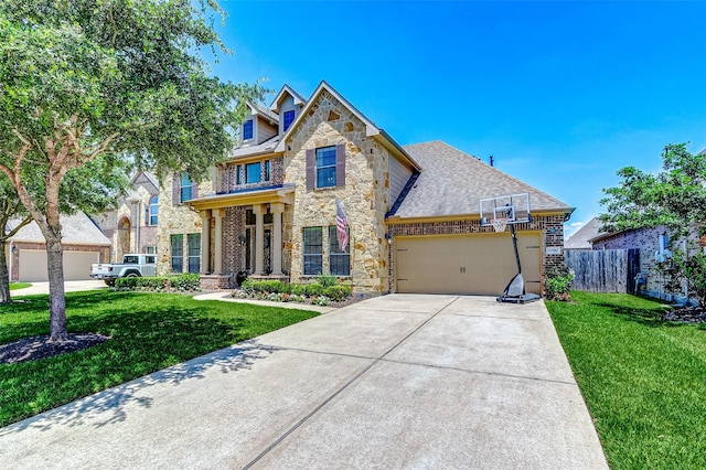 20910 Cordell Landing Dr, Richmond, TX 77407 - view of front of property with stone siding, concrete driveway, an attached garage, and brick siding