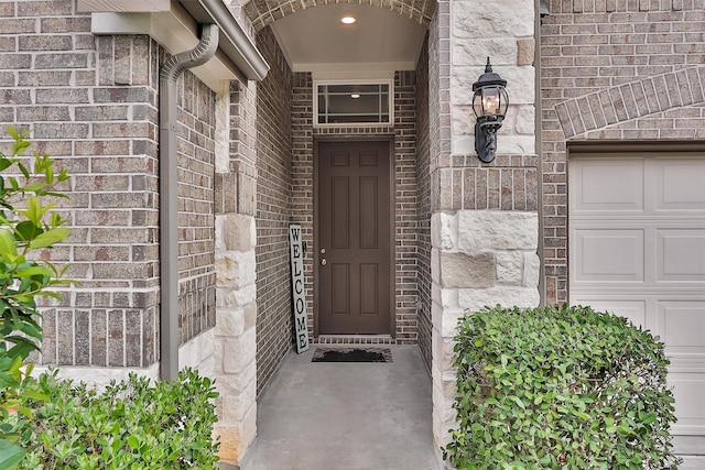 222 Speckled Woods Pl, Conroe, TX 77318 - doorway to property with brick siding