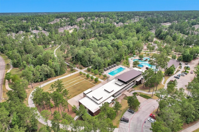 222 Speckled Woods Pl, Conroe, TX 77318 - drone / aerial view of a heavily wooded area