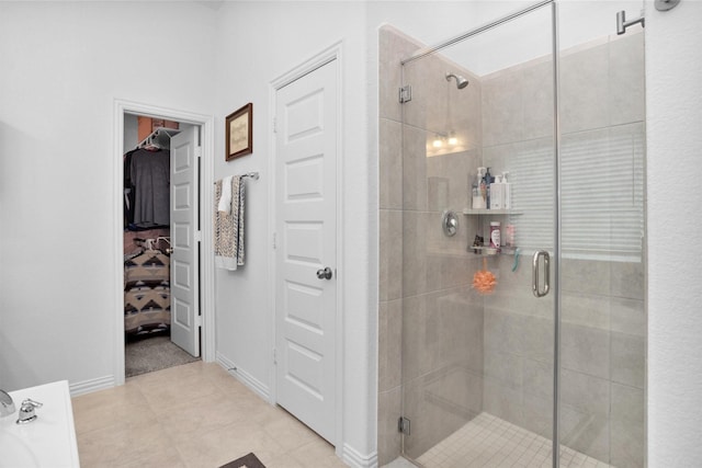 222 Speckled Woods Pl, Conroe, TX 77318 - full bath featuring a stall shower and tile patterned floors