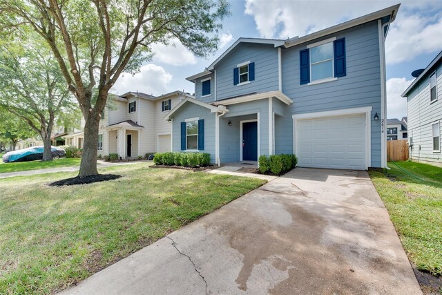 2614 Skyview Shadows Ct, Houston, TX 77047 - traditional home featuring a garage and driveway