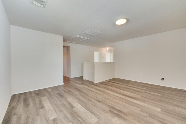 2614 Skyview Shadows Ct, Houston, TX 77047 - unfurnished room featuring attic access and light wood-type flooring