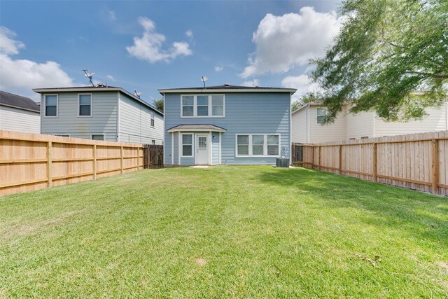 2614 Skyview Shadows Ct, Houston, TX 77047 - back of house with a fenced backyard