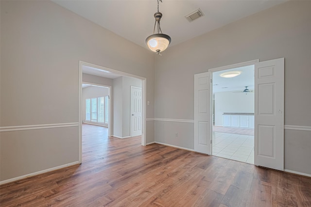 10815 Shawnbrook Dr, Houston, TX 77071 - empty room with wood finished floors and ceiling fan