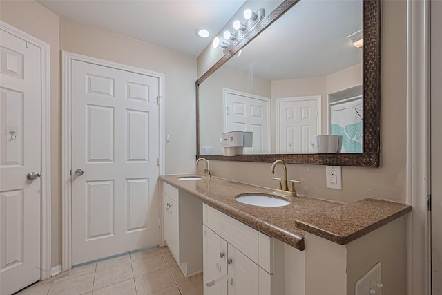 10815 Shawnbrook Dr, Houston, TX 77071 - bathroom with double vanity and tile patterned floors