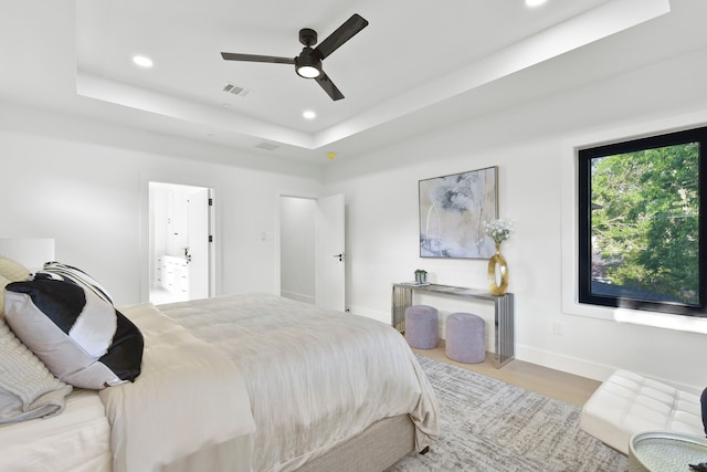 5115 Maple St, Houston, TX 77401 - bedroom featuring a raised ceiling, recessed lighting, wood finished floors, and ceiling fan