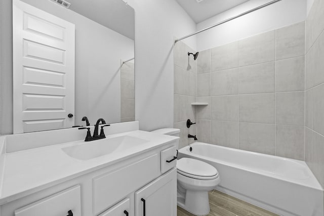 3244 Stingray Cove Dr, Katy, TX 77493 - full bathroom featuring vanity, wood finished floors, and bathing tub / shower combination