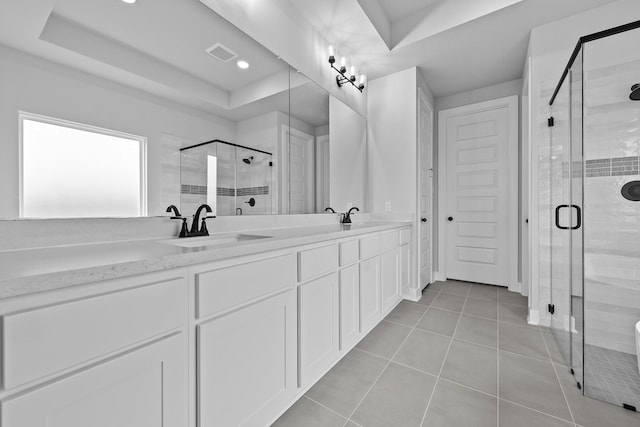 3244 Stingray Cove Dr, Katy, TX 77493 - full bathroom featuring a stall shower, double vanity, tile patterned floors, a tray ceiling, and recessed lighting