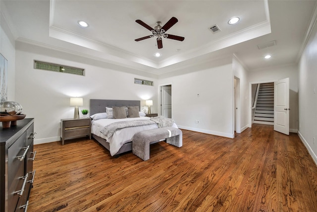 1822 Gardenia Dr, Houston, TX 77018 - bedroom featuring a raised ceiling, dark wood-style floors, crown molding, recessed lighting, and ceiling fan