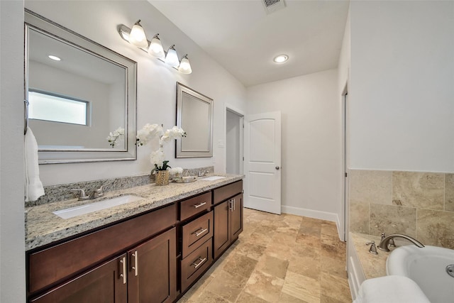 1822 Gardenia Dr, Houston, TX 77018 - full bath featuring double vanity, a tub to relax in, and stone finish flooring