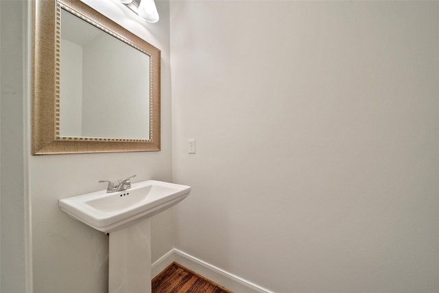 1822 Gardenia Dr, Houston, TX 77018 - bathroom with baseboards and wood finished floors