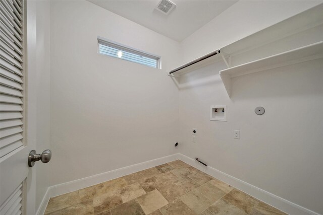 1822 Gardenia Dr, Houston, TX 77018 - washroom featuring hookup for a gas dryer, washer hookup, hookup for an electric dryer, and stone finish floors