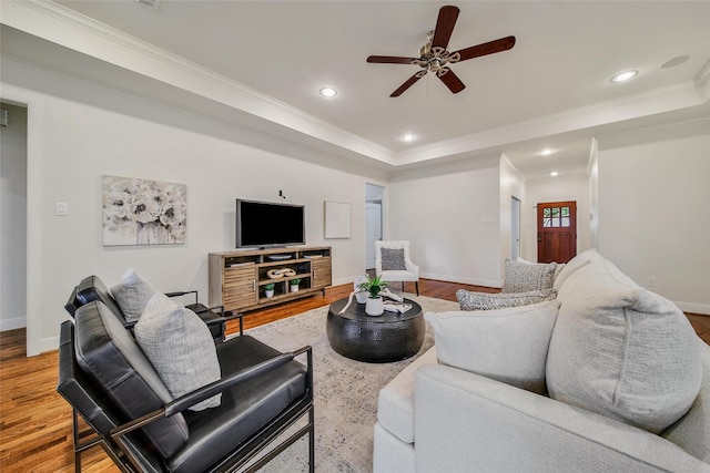 1822 Gardenia Dr, Houston, TX 77018 - living room with a ceiling fan, a tray ceiling, ornamental molding, wood finished floors, and recessed lighting