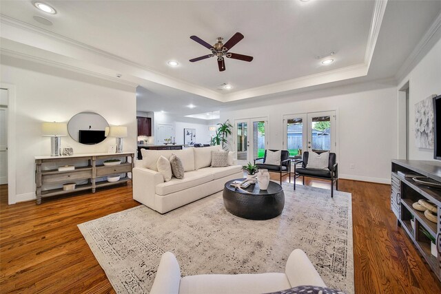 1822 Gardenia Dr, Houston, TX 77018 - living area featuring a tray ceiling, crown molding, a ceiling fan, dark wood-style flooring, and recessed lighting