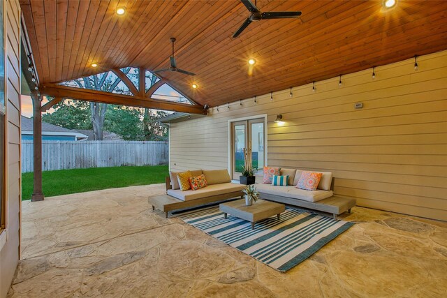 1822 Gardenia Dr, Houston, TX 77018 - fenced backyard featuring french doors, outdoor lounge area, a patio area, and a ceiling fan