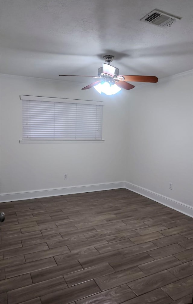 12110 Timberlake Dr, Cypress, TX 77429 - unfurnished room featuring ceiling fan, dark wood finished floors, and ornamental molding