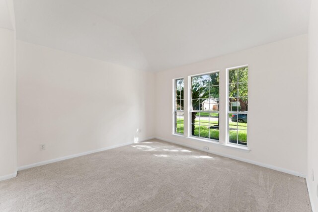 1627 Pebble Brk, Missouri City, TX 77459 - carpeted spare room with baseboards and lofted ceiling
