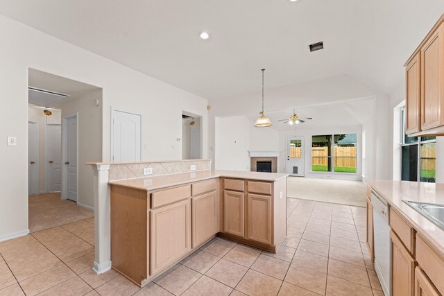 1627 Pebble Brk, Missouri City, TX 77459 - kitchen featuring dishwasher, a fireplace, a ceiling fan, open floor plan, and light tile patterned flooring