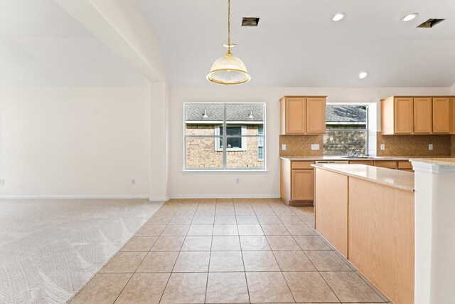 1627 Pebble Brk, Missouri City, TX 77459 - kitchen with decorative backsplash, pendant lighting, recessed lighting, light brown cabinetry, and light tile patterned floors