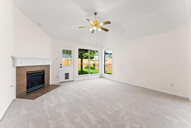 1627 Pebble Brk, Missouri City, TX 77459 - unfurnished living room with carpet flooring, a ceiling fan, a tile fireplace, and high vaulted ceiling