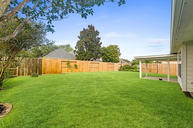 1627 Pebble Brk, Missouri City, TX 77459 - fenced backyard featuring a patio area