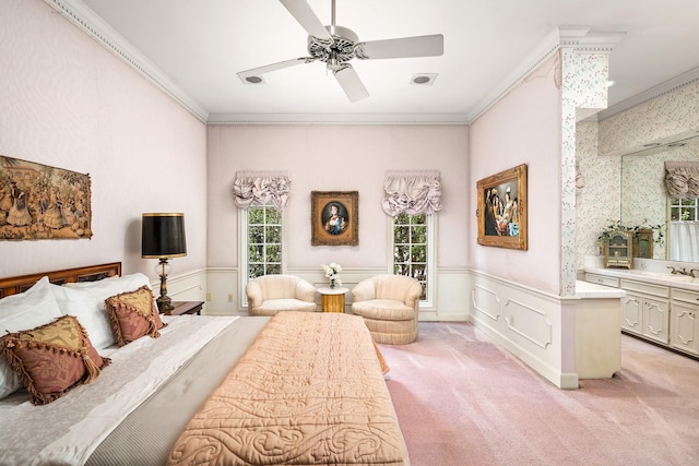 903 Rocky River Rd, Houston, TX 77056 - bedroom with ornamental molding, light colored carpet, a wainscoted wall, and a ceiling fan