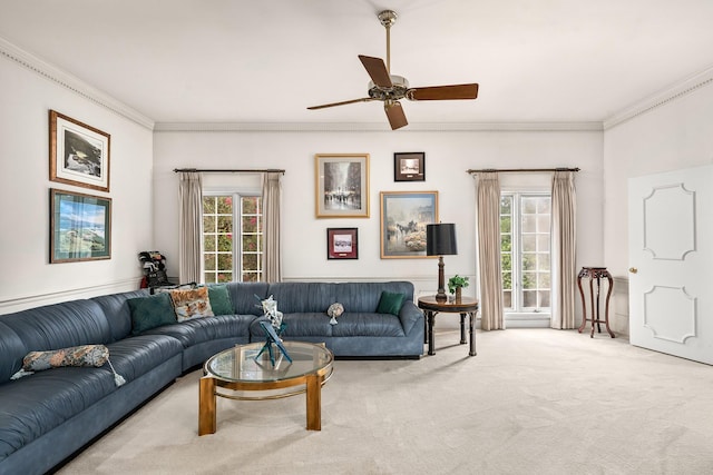 903 Rocky River Rd, Houston, TX 77056 - living area with crown molding, ceiling fan, and light colored carpet