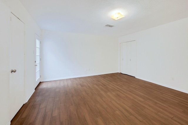 20031 Sunny Shores Dr, Humble, TX 77346 - unfurnished room featuring dark wood-style floors and baseboards