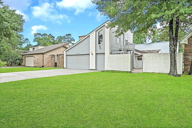 20031 Sunny Shores Dr, Humble, TX 77346 - mid-century home featuring concrete driveway and a garage