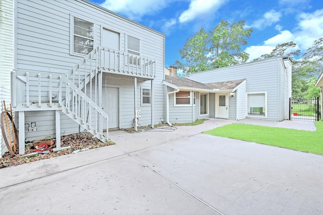 20031 Sunny Shores Dr, Humble, TX 77346 - view of front of property with a patio area and stairway