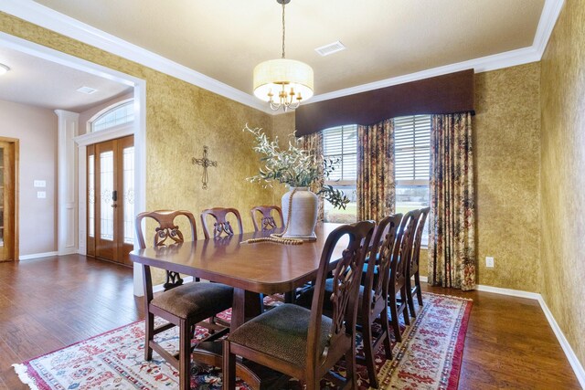 34210 Sanders Ranch Rd, Magnolia, TX 77355 - dining area with wood finished floors, a chandelier, crown molding, and french doors