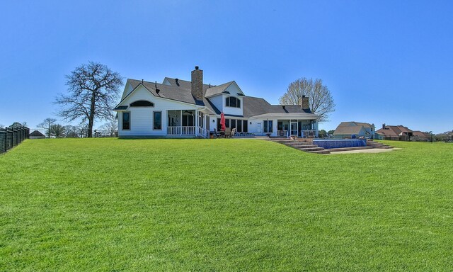 34210 Sanders Ranch Rd, Magnolia, TX 77355 - back of property with a yard, a chimney, and a patio area