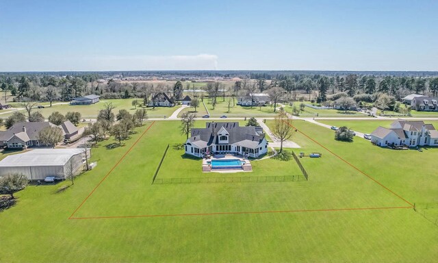 34210 Sanders Ranch Rd, Magnolia, TX 77355 - aerial view of residential area featuring a pool area and a tree filled landscape