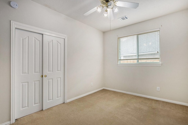 24006 Northshire Ln, Katy, TX 77494 - unfurnished bedroom featuring carpet flooring, a closet, and ceiling fan