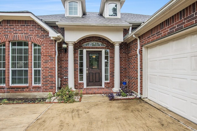 24006 Northshire Ln, Katy, TX 77494 - doorway to property with brick siding, a shingled roof, an attached garage, and concrete driveway