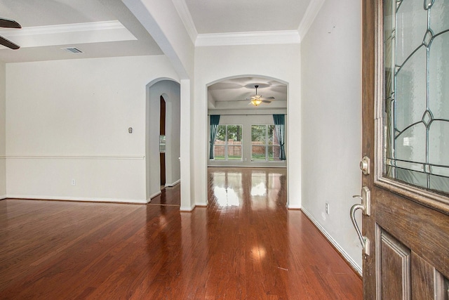 24006 Northshire Ln, Katy, TX 77494 - foyer featuring a ceiling fan, wood finished floors, ornamental molding, and arched walkways