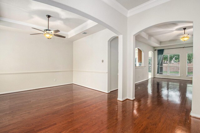 24006 Northshire Ln, Katy, TX 77494 - spare room featuring a ceiling fan, wood finished floors, crown molding, and a tray ceiling