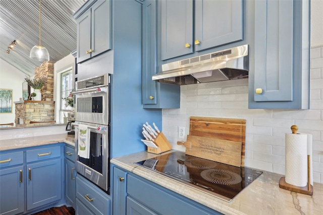 243 Riverbirch, Brookeland, TX 75931 - kitchen featuring under cabinet range hood, black electric stovetop, blue cabinets, double oven, and backsplash