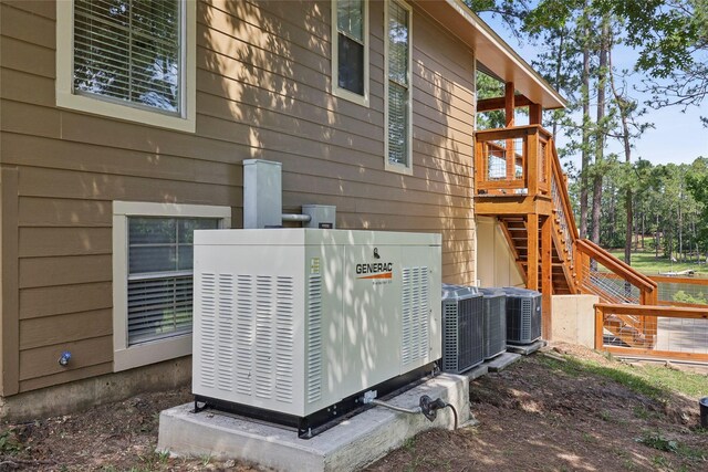 243 Riverbirch, Brookeland, TX 75931 - view of side of property featuring stairway and a deck