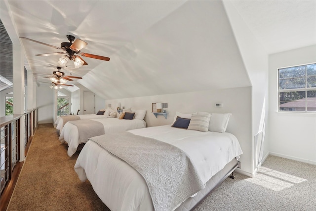 243 Riverbirch, Brookeland, TX 75931 - bedroom with carpet, lofted ceiling, multiple windows, and ceiling fan